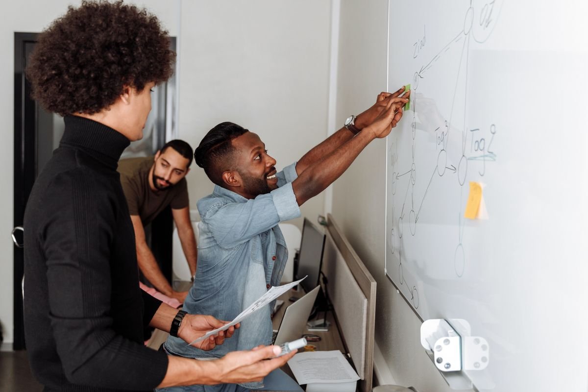 African professionals collaborating in a modern workspace